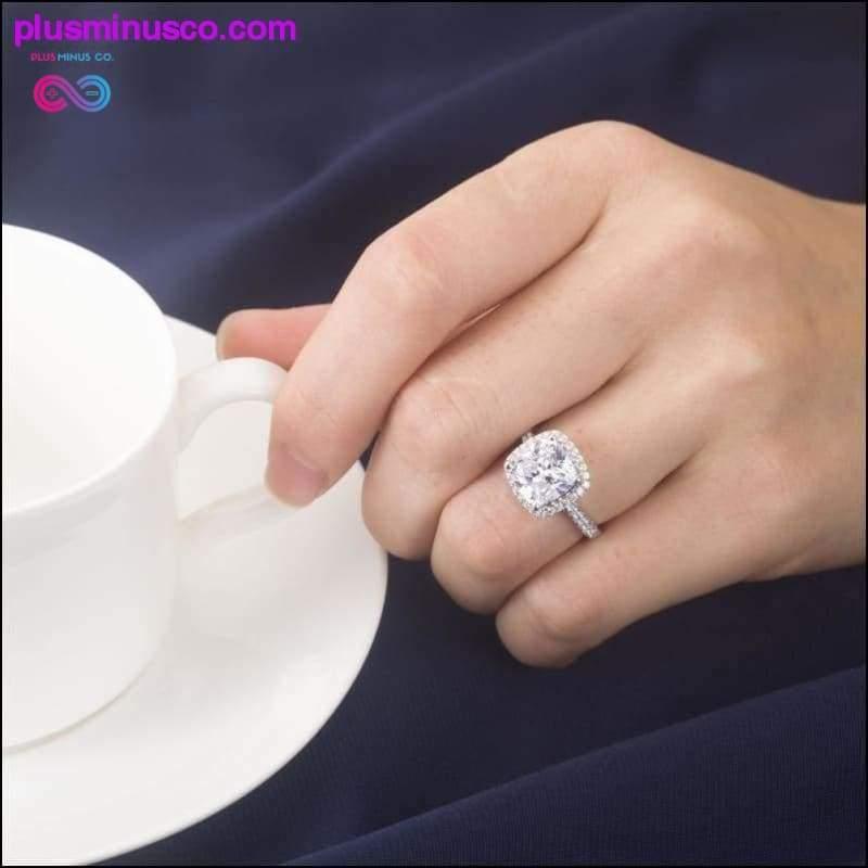 2-karatowy pierścionek z brylantem w kształcie poduszki w stylu Halo || - plusminusco.com
