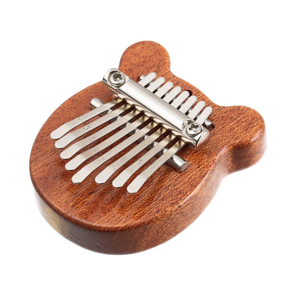 Mini Piano de pulgar Kalimba de 8 teclas, arpa de dedo exquisita portátil, instrumento Musical de Piano de dedo fácil de aprender, regalos para principiantes - plusminusco.com