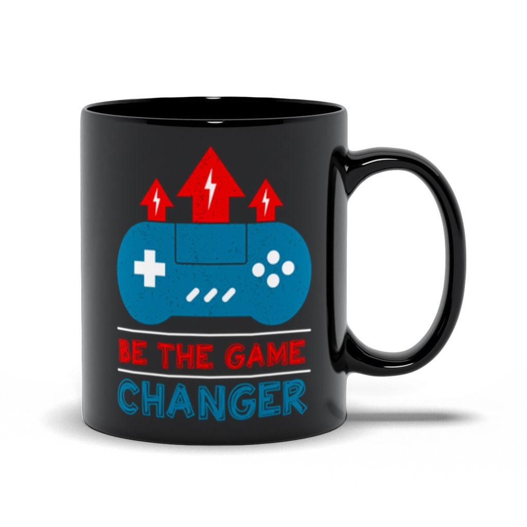 Be The Game Changer mustat mukit, pelinvaihtaja, ainutlaatuinen keraaminen mukilahja, inspiroiva pelaajalahja, videopelien motivaatiomuki - plusminusco.com