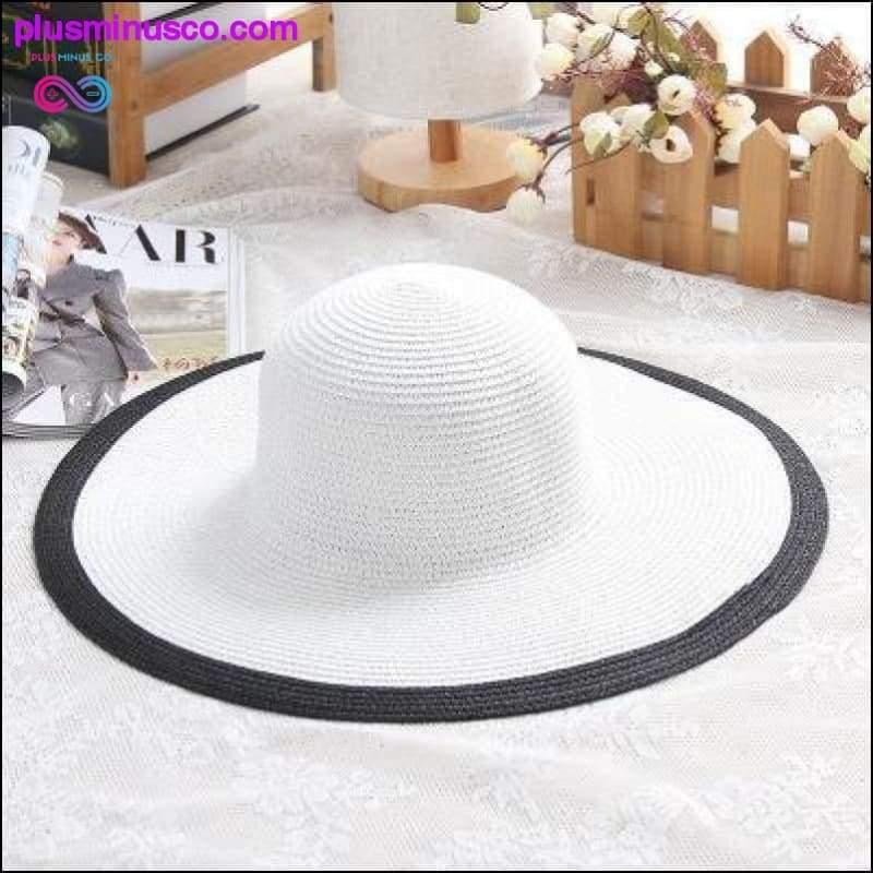 黒と白のストライプのちょう結び夏の太陽の帽子美しい女性 - plusminusco.com