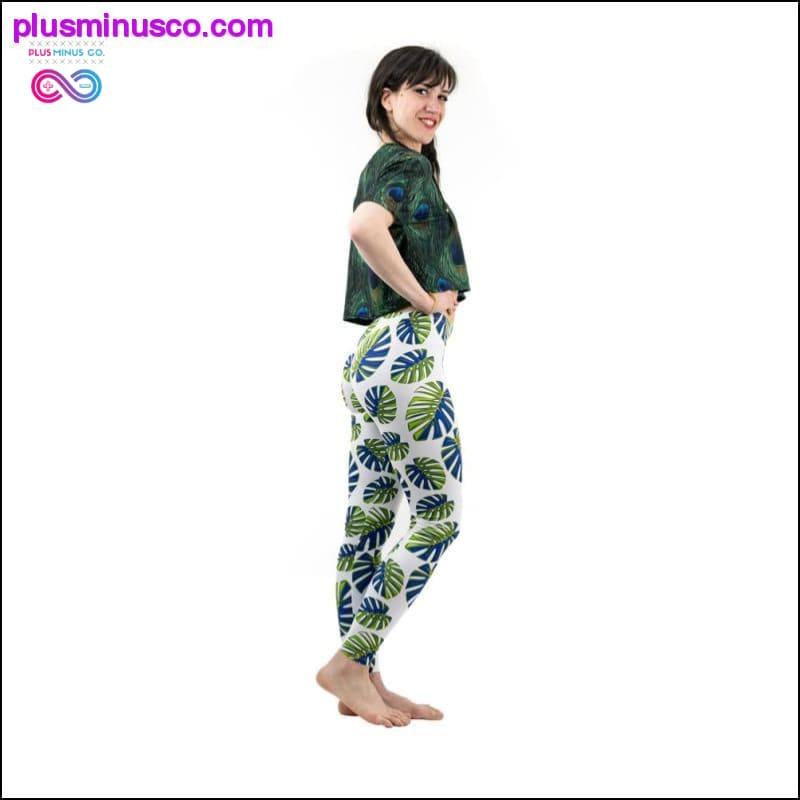 Moda damska Trend Białe legginsy w zielone liście - plusminusco.com