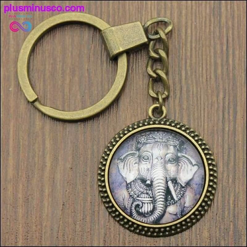 Portachiavi cabochon in vetro con elefante Ganesha da 25 mm di alta qualità - plusminusco.com