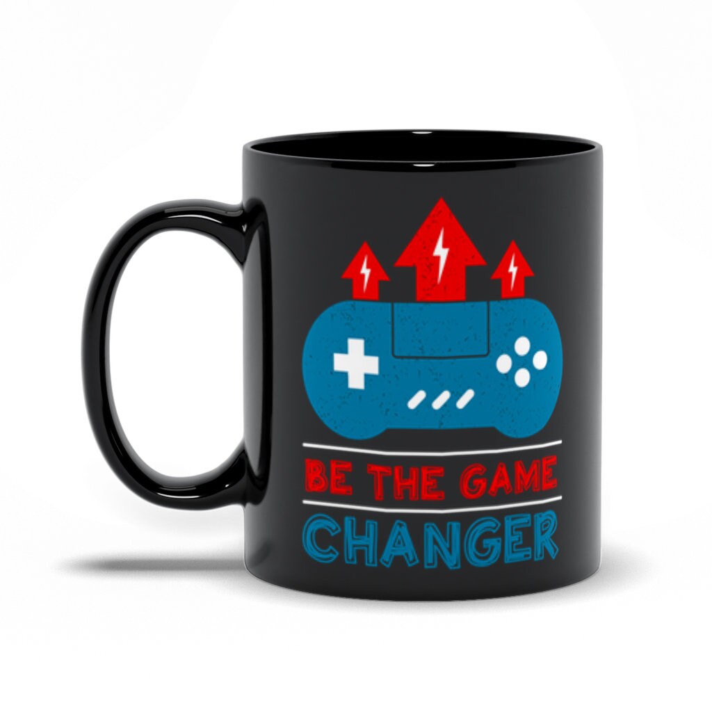 „Be The Game Changer“ juodi puodeliai, žaidimų keitiklis, unikali keraminio puodelio dovana, įkvepianti žaidėjo dovana, motyvuojantis vaizdo žaidimų puodelis – plusminusco.com