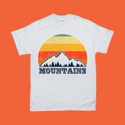 جبال | تي شيرت ريترو غروب الشمس، قميص بيج فوت بطل العالم غير المهزوم - plusminusco.com