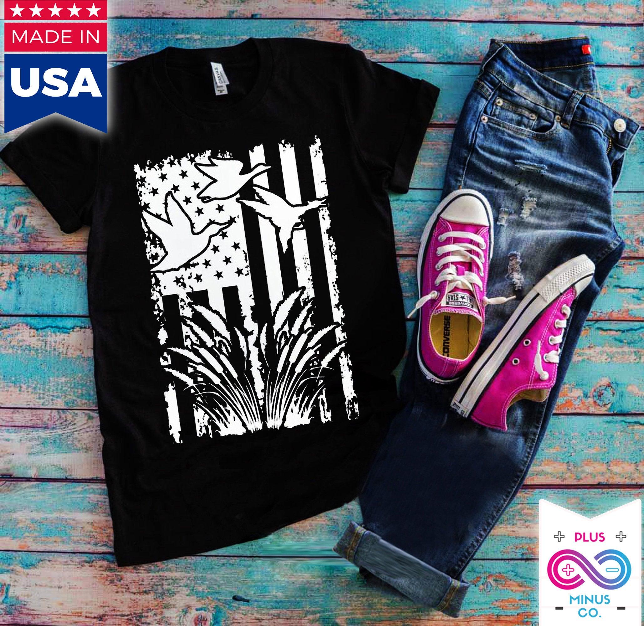 Flying Duck, American Flag T-Shirts, Duck Hunting Flying Waterfowl Hunter American Flag Camo T-Shirt duck hunting, duck hunting gift, duck hunting shirt, fowl hunting, gift for him, hunting, hunting gift, hunting gifts, hunting shirt, hunting tee, hunting tshirt, water fowl, waterfowl hunting - plusminusco.com