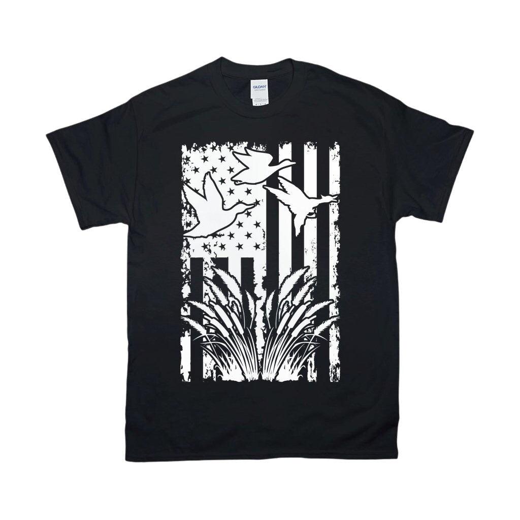 Flying Duck, American Flag T-Shirts, Duck Hunting Flying Waterfowl Hunter American Flag Camo T-Shirt duck hunting, duck hunting gift, duck hunting shirt, fowl hunting, gift for him, hunting, hunting gift, hunting gifts, hunting shirt, hunting tee, hunting tshirt, water fowl, waterfowl hunting - plusminusco.com