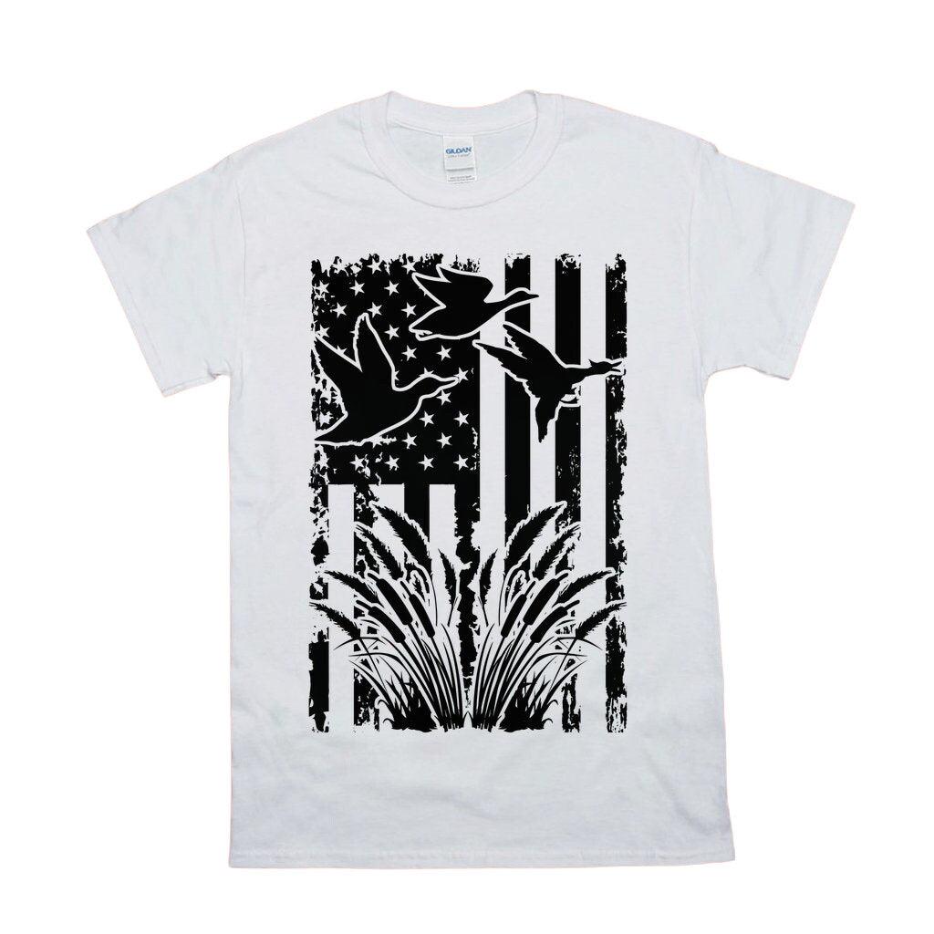 Flying Duck, American Flag T-Shirts, Duck Hunting Flying Waterfowl Hunter American Flag Camo T-Shirt duck hunting, duck hunting gift, duck hunting shirt, fowl hunting, gift for him, hunting, hunting gift, hunting gifts, hunting shirt, hunting tee, hunting tshirt, water fowl, waterfowl hunting - plusminusco.com