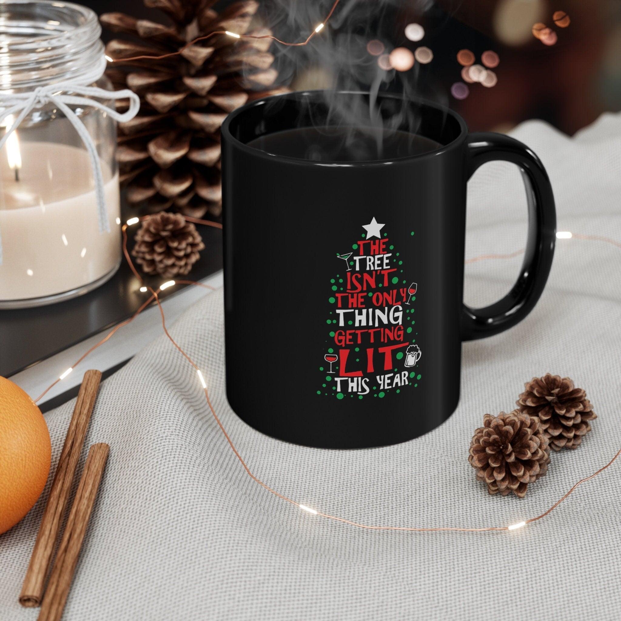 The Tree Isn&#39;t The Only Thing Getting Lit This Year Classic Black Mugs, Ceramic Coffee Mug, Christmas Coffee Mug, Christmas gift, Christmas gift idea, Christmas mug, Coffee mug, Custom mug, Decorative Mug, Enamel mug, Funny Xmas Mug, Gift for Christmas, Holiday gift, Personalized mug - plusminusco.com