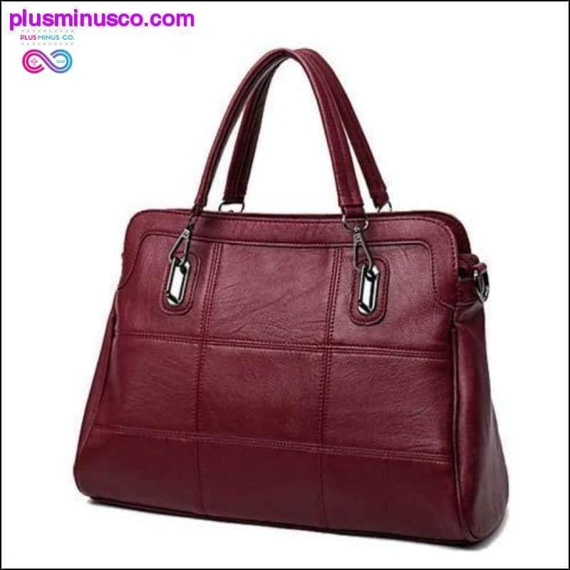 洗練されたスタイルの女性用ブラック本革ハンドバッグ - plusminusco.com